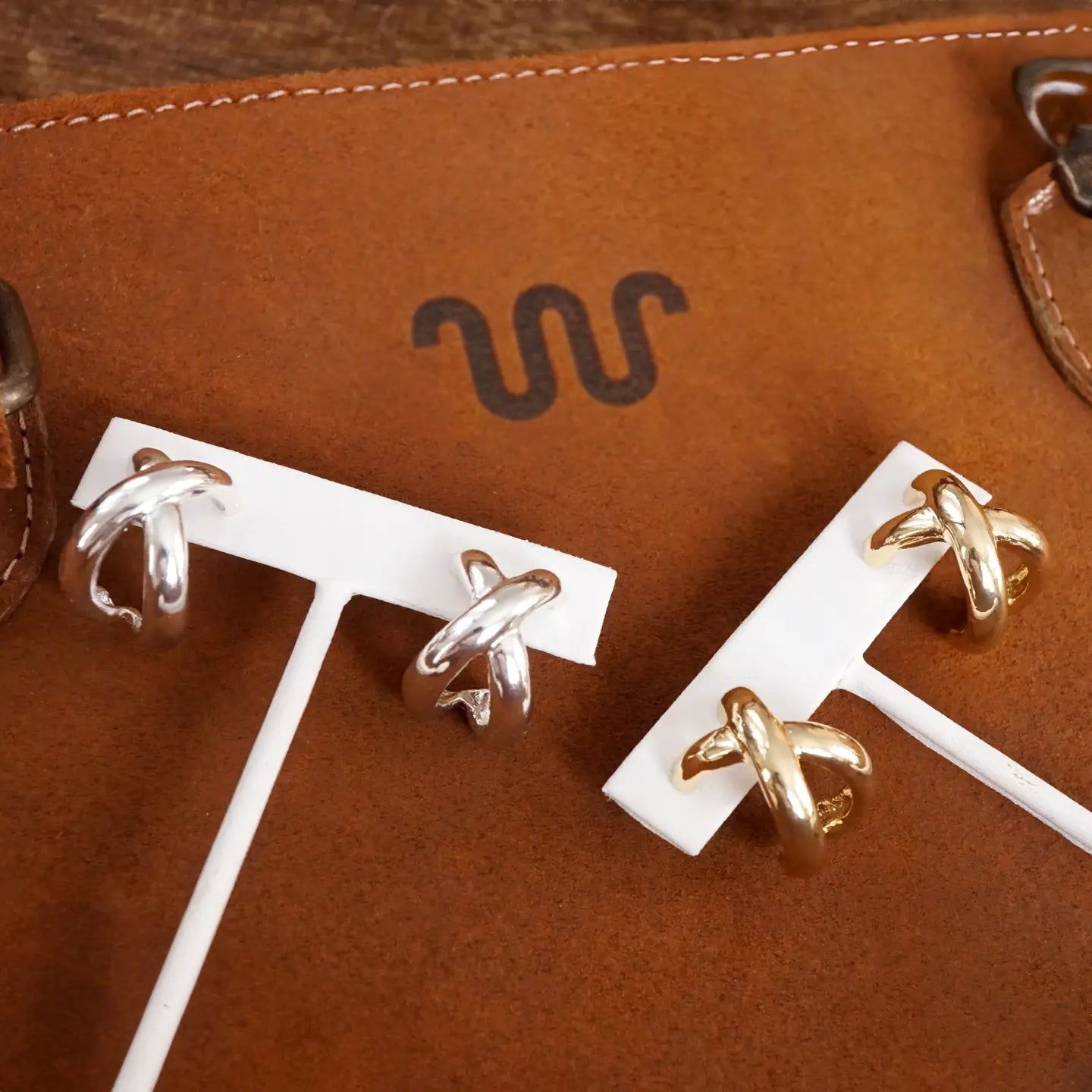 Huggie Statement Hoop Earrings – Criss Cross Design in Silver
