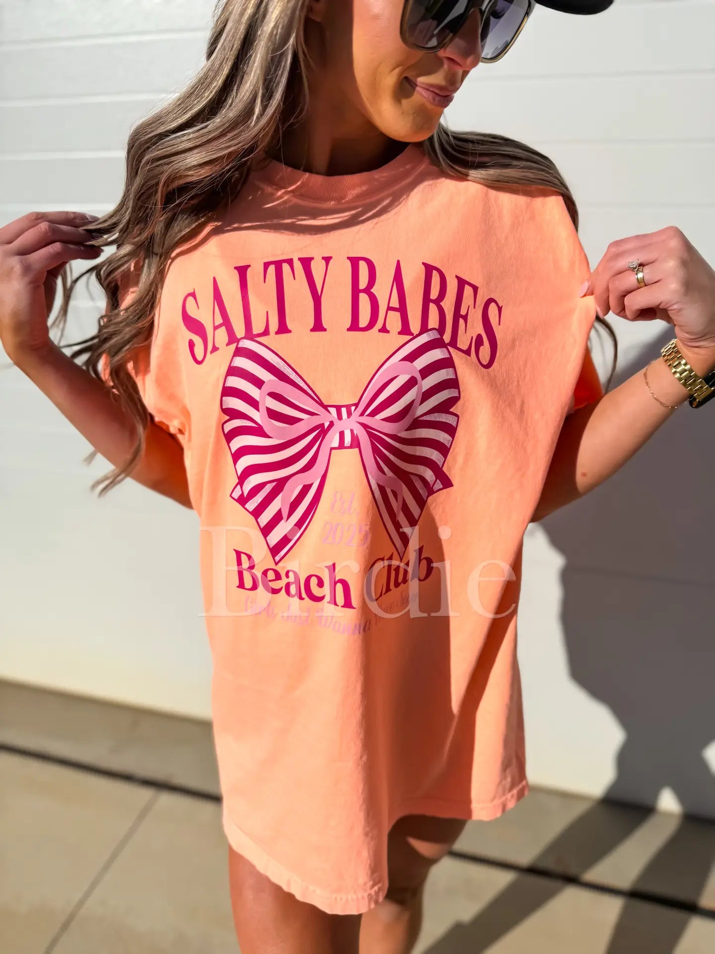 Salty Babes with Pink Bow Graphic Tee On Neon Cantaloupe
